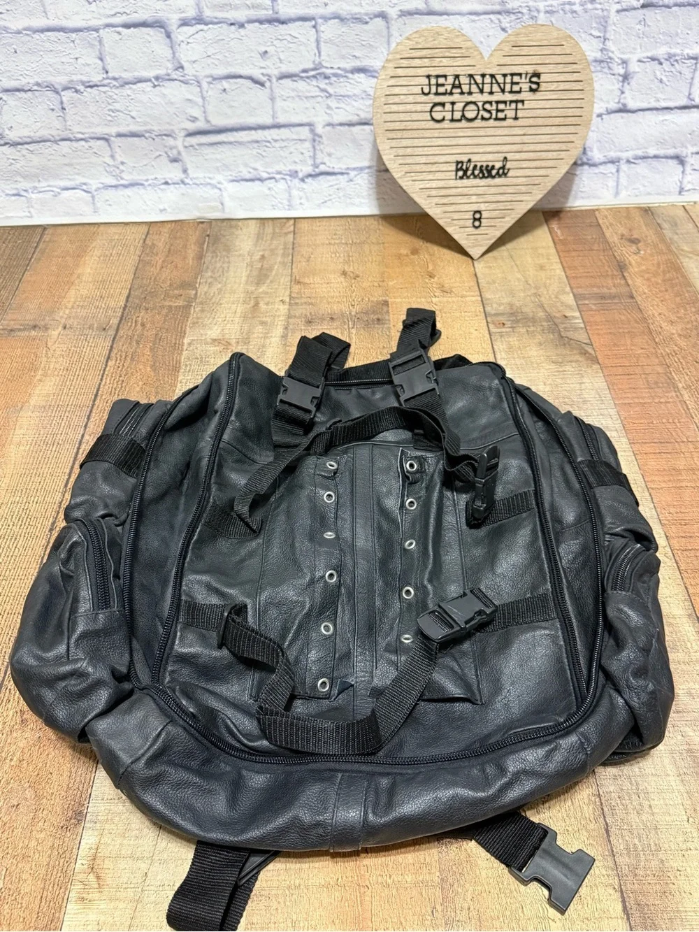 Heavy Duty Black Leather Motorcycle Backpack  Pre owned good condition.. there i